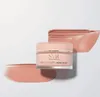 A jar of SVR Densitium Rose Eclat cream is shown with two swatches of the cream on a white and light gray background. Náhled obrázku produktu