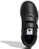 A close-up, top-down view of a black Adidas children's shoe with white accents and Velcro straps, set against a white background. Podgląd zdjęcia produktu