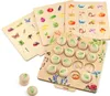 A wooden memory game with various nature-themed cards and game pieces. Anteprima dell’immagine prodotto