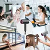 A collage of images showing a hairdryer being used in various settings, including a family home, a gym, and a dormitory. Produktbild-Vorschau