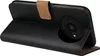 A black flip case for a smartphone is shown open, revealing the phone's camera module. Produktbild-Vorschau