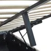 Close-up view of the underside of a bed frame, showing the wooden slats and metal support structure. Produktbild-Vorschau