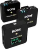 Three black Rode Wireless GO II microphone transmitters are arranged in a group against a white background. Náhled obrázku produktu