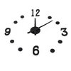 A black wall clock with numbers and hands on a white background. Náhled obrázku produktu