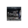 A person is using a cordless vacuum cleaner in a living room setting. Produktbild-Vorschau