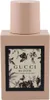 Gucci Bloom Nettare di Fiori Flakon in mattem Rosa mit Etikett aus Pflanzen- und Schmetterlingsillustrationen. Podgląd zdjęcia produktu