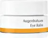 A close-up of a white jar of eye balm with orange and gray accents. Anteprima dell’immagine prodotto