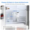 A water filter pitcher placed inside a refrigerator, with dimensions indicated. Podgląd zdjęcia produktu
