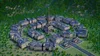 A miniature city model with the Eiffel Tower at its center, surrounded by buildings and trees. Produktbild-Vorschau