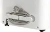 A close-up view of the back of a white appliance, showing a coiled power cord and its plug secured by white clips. Produktbild-Vorschau