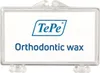 A clear, front-facing product shot of a small, clear plastic case containing orthodontic wax. The case has a white label with the TePe logo and the text 'Orthodontic wax'. Produktbild-Vorschau