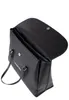 A black Valentino handbag is shown from a slightly elevated diagonal angle, with its flap open. Produktbild-Vorschau