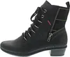 A side view of a black boot with a plaid shaft. Voir les images du produit
