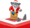 A close-up of a Christmas-themed elephant figurine on a red base. Náhled obrázku produktu