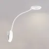 A white LED clip-on lamp with a flexible gooseneck and a circular light head, shown against a plain light gray background. Produktbild-Vorschau