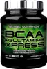 A black plastic container of BCAA + Glutamine Xpress supplement powder with a green label. Produktbild-Vorschau