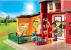 A Playmobil pet hotel playset with figures and dogs in a sunny outdoor setting. Produktbild-Vorschau
