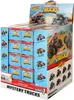 A display box filled with Hot Wheels Monster Trucks mystery boxes, with a larger promotional image on the side. Náhľad obrázku produktu