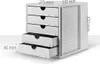 A white drawer unit with labels on the drawers. Voir les images du produit