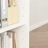 A close-up view of a bookshelf with books and magazine holders. Náhled obrázku produktu