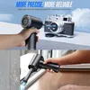 A collage of two images showing a black electronic duster being used to clean a camera and a window frame. Podgląd zdjęcia produktu