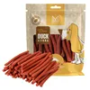 A bag of dog treats with some treats spilled in front. Produktbild-Vorschau