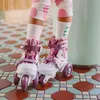 Kinder-Rollschuh-Set Cariboo Ballerina + lila Schützer - S Produktbild-Vorschau 4