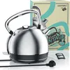 A silver retro-style electric kettle is shown in front of its packaging. Podgląd zdjęcia produktu