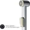 A close-up of a bidet sprayer with text indicating it has been rigorously tested. Produktbild-Vorschau