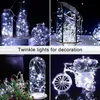 A collage of four images showing decorative string lights in various settings, including glass vases, a geometric terrarium, and a decorative bicycle basket. Produktbild-Vorschau