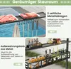 A close-up view of a grill pavilion's storage features, including shelves and hooks, with a pool in the background. Produktbild-Vorschau