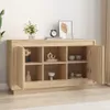 A wooden sideboard with open doors, displaying various decorative items and shelves. Anteprima dell’immagine prodotto