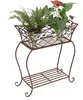 A metal plant stand with two potted plants. Anteprima dell’immagine prodotto