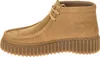 A side view of a brown suede clog. Voir les images du produit