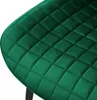 A close-up view of a dark green quilted velvet chair seat. Náhled obrázku produktu
