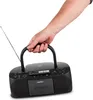 A hand is holding a black Medion stereoradio with a cassette player and CD player. Produktbild-Vorschau