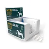 A display box filled with packaging for a pet supplement, with some blister packs of tablets visible. Podgląd zdjęcia produktu