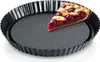 A slice of cherry pie sits in a fluted tart pan. Produktbild-Vorschau