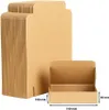 A stack of folded cardboard boxes and one open box with dimensions indicated. Náhled obrázku produktu