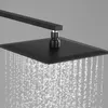 A close-up view of a black square shower head with water spraying from it. Náhled obrázku produktu