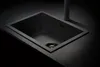 A dark, modern kitchen sink. Produktbild-Vorschau