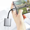 A hand holding a smartphone connected to a Mcdodo adapter, which is plugged into the phone's USB-C port. The adapter has two cables plugged into it, one for charging and one for audio. Náhľad obrázku produktu