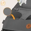 Close-up of a gray baby bouncer with a mesh fabric detail highlighted, and a small orange arrow pointing to it. A small tag with 'June Air' is visible. Produktbild-Vorschau