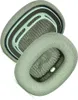 Two green ear pads for headphones are shown against a white background. Podgląd zdjęcia produktu