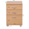 A close-up view of a light brown, three-drawer filing cabinet with silver handles, showing dimensional measurements. Produktbild-Vorschau