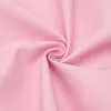 A close-up, swirled view of pink fabric. Podgląd zdjęcia produktu
