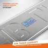 Close-up of the back of a metal license plate with embossed letters and a sticker. Produktbild-Vorschau
