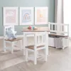 A children's table and chairs set with a storage bench in a room with framed artwork on the wall. Produktbild-Vorschau