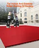 A person wearing roller skates stands on red interlocking tiles in front of a building. Podgląd zdjęcia produktu
