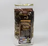 A clear shot of a product bag filled with ingredients, with a label on the front. Podgląd zdjęcia produktu